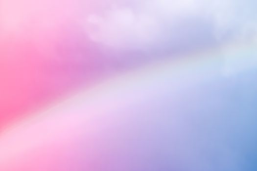 Rainbow in fantasy pink and blue sky, spiritual and nature backgrounds