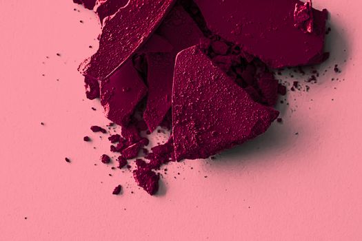 Burgundy eye shadow powder as makeup palette closeup, crushed cosmetics and beauty textures