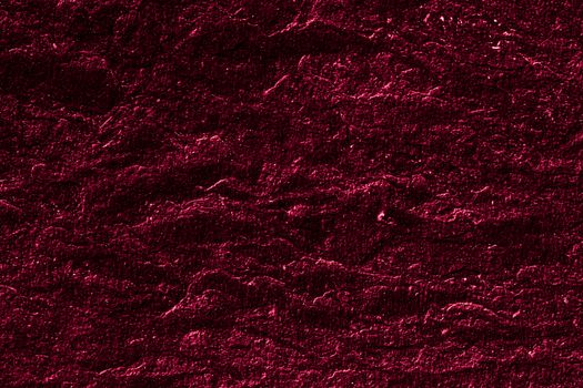 Red stone texture as abstract background, design material and textured surfaces