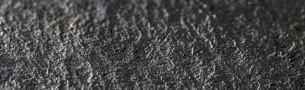 Gray stone texture as abstract background, design material and textured surfaces
