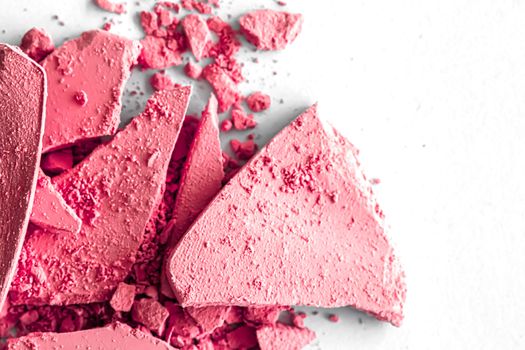 Red eye shadow powder as makeup palette closeup isolated on white background, crushed cosmetics and beauty textures