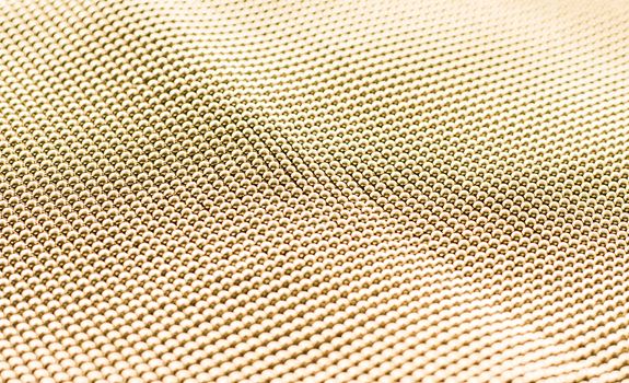 Golden metallic abstract background, futuristic surface and high tech materials