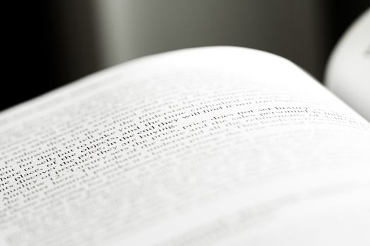 Macro closeup of an open book, education and studies