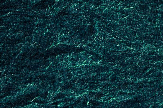 Emerald green stone texture as abstract background, design material and textured surfaces