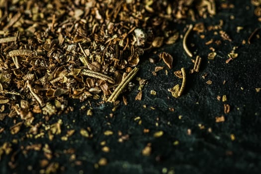 Provencal spices mix closeup on luxury stone background as flat lay, dry food spices and recipe ingredients