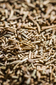 Rosemary closeup on luxury stone background as flat lay, dry food spices and recipe ingredients