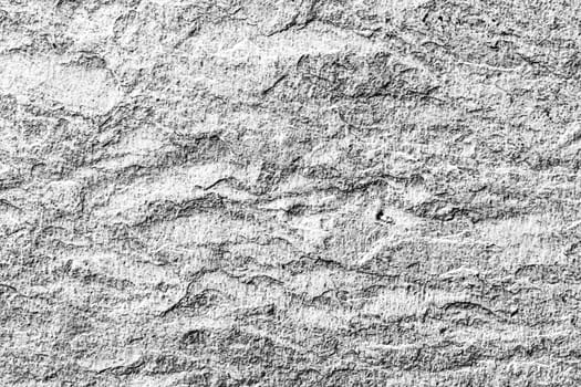 Light stone texture as abstract background, design material and textured surfaces