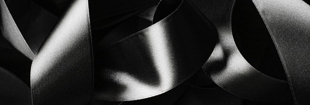 Black and white silk ribbon as background, abstract and luxury brand designs