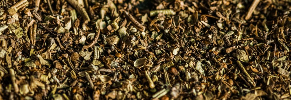 Provencal spices mix closeup on luxury stone background as flat lay, dry food spices and recipe ingredients