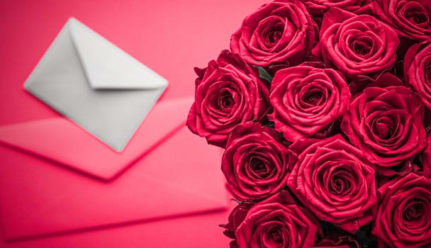 Holidays gift, floral present and happy relationship concept - Love letter and flowers delivery on Valentines Day, luxury bouquet of roses and card on pink background for romantic holiday design