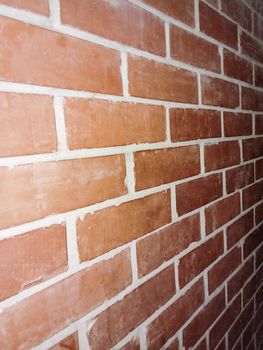 red colored bricks wall closeup in house