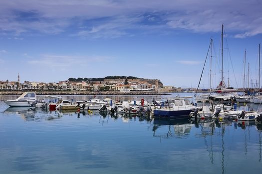 RETHYMNO, THE CRETE ISLAND, GREECE - MAY 30, 2019: Beautiful yachts in the harbour of Rethymno, the Crete island, Greece.