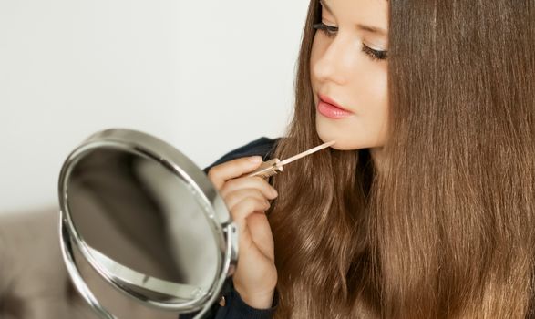 Beauty blogger applying makeup, portrait of beautiful model woman, skincare and cosmetic ad