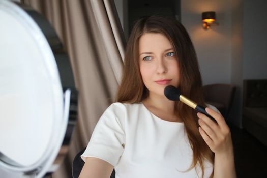 Beauty blogger applying makeup, portrait of beautiful model woman, skincare and cosmetic ad