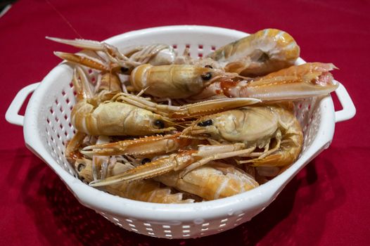 Prawns to drain ready for fresh fish soup with seafood