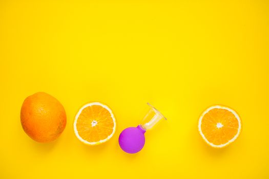 Bright oranges and a jar for anti-cellulite massage. Healthy lifestyle concept. Cellulite, diet, orange peel.