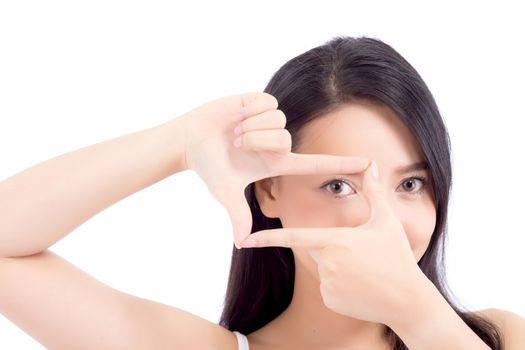 Beauty of portrait asian young woman face and eye care with make up, skincare and cosmetic for wellness, girl with gesture frame with hand shape.