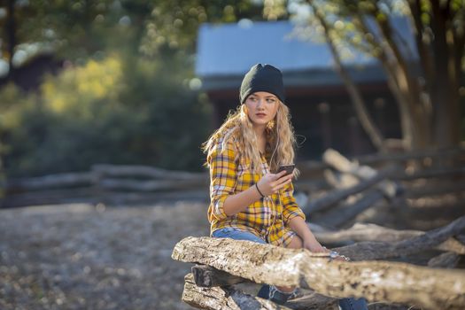A gorgeous young blonde model enjoys a day outdoors while maintaining a safe distance from others during the Covid-19 pandemic