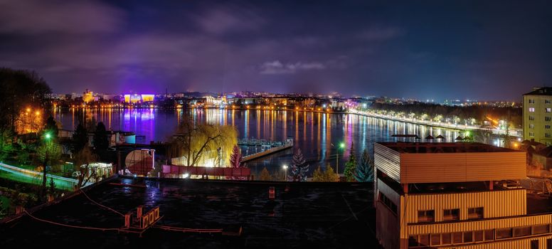 Ternopil, Ukraine 01.05.2020. Panoramic view of Ternopil pond and castle in Ternopol, Ukraine, on a winter night