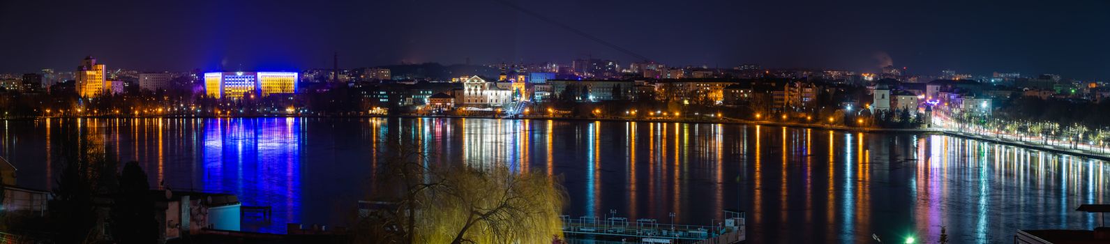 Ternopil, Ukraine 01.05.2020. Panoramic view of Ternopil pond and castle in Ternopol, Ukraine, on a winter night