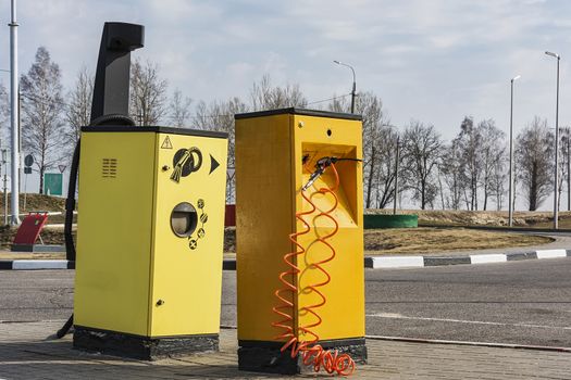 Belarus, Minsk-April 10, 2018: Compressor for car tires pumping and vacuum cleaner at gas station