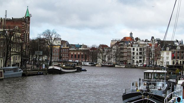 Netherlands, Amsterdam – February 24, 2015: the City's skyline. Water canal on the territory of the city