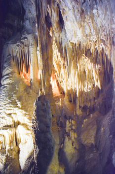spectacular stalactites in a network of caves in Italy