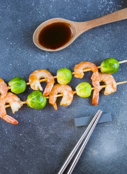 shrimps and vegetables on the table, ready to eat, souse and delishes food. Studio shot.