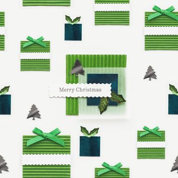 Seamless photo pattern with Merry Christmas greeting on presents. Scrapbooking styled photo with green paper New Year gifts and fir tree confetti. Winter holiday background.