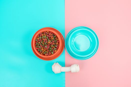 Pet food and snack with copy space on color background