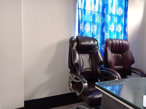 chocolate colored chair stock and wooden table in hall room