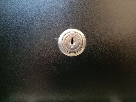 lock and key closeup on wooden board for sell
