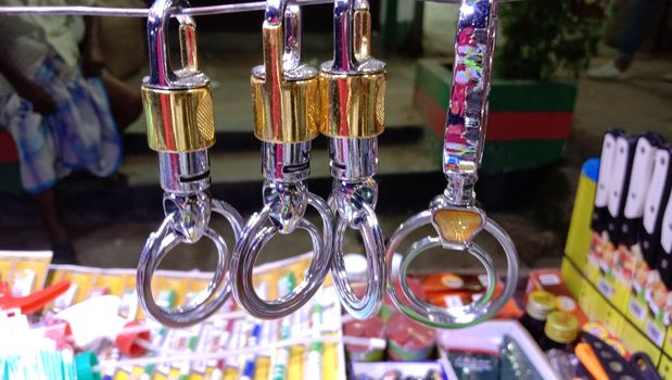 golden and steel made key ring stock on shop for sell