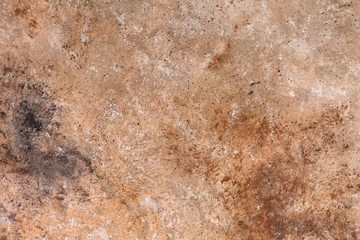 Concrete beige brown black background with scuffs and splashes. Textured wall texture in the grunge style with soft focus. Space for text