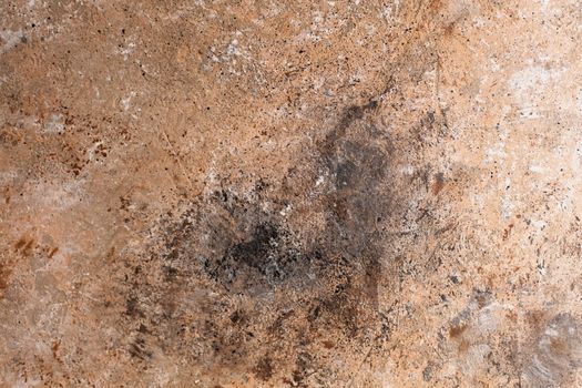 Concrete beige brown black background with scuffs and splashes. Textured wall texture in the grunge style with soft focus. Space for text