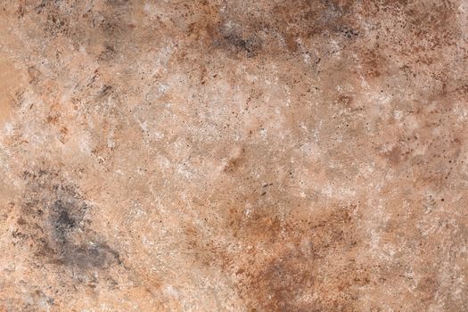 Concrete beige brown black background with scuffs and splashes. Textured wall texture in the grunge style with soft focus. Space for text