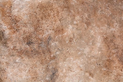 Concrete beige brown black background with scuffs and splashes. Textured wall texture in the grunge style with soft focus. Space for text