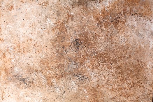 Concrete beige brown black background with scuffs and splashes. Textured wall texture in the grunge style with soft focus. Space for text
