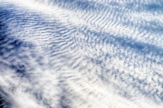 Blue Sky with Stripes Clouds Texture with copy space, may use as background