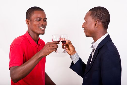 celebration, between two happy business people holding glasses of wine and toast