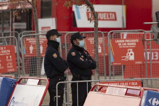 Police and state security forces and bodies, guarding the finish area of the fourth stage of La Vuelta a España 2020.