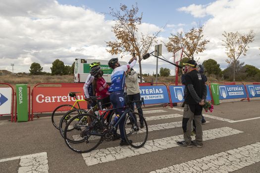 Journalists, photographers and media, working in the finish line area of the fourth stage of La Vuelta a España 2020.