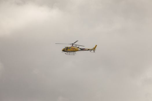 Television helicopter in information and broadcasting tasks, in the area of the finish line of the fourth stage of La Vuelta a España 2020.