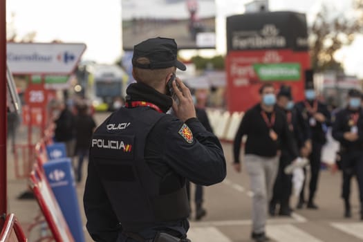 Police and state security forces and bodies, guarding the finish area of the fourth stage of La Vuelta a España 2020.