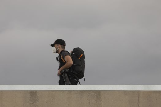 Photojournalists, photographers and media, working in the finish line area of the fourth stage of La Vuelta a España 2020.