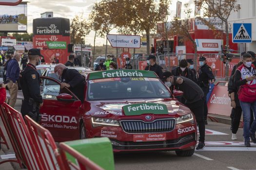 Staff and workers of the organization of the race and the cycling tour, in the finish area of the fourth stage of La Vuelta a España 2020.