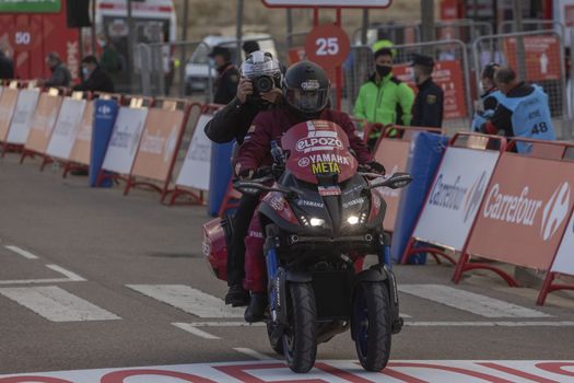 Staff and workers of the organization of the race and the cycling tour, in the finish area of the fourth stage of La Vuelta a España 2020.