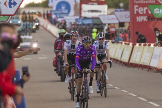 Cyclists, athletes, in the area of the finish line of the fourth stage of La Vuelta a España 2020.