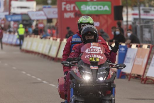 Staff and workers of the organization of the race and the cycling tour, in the finish area of the fourth stage of La Vuelta a España 2020.