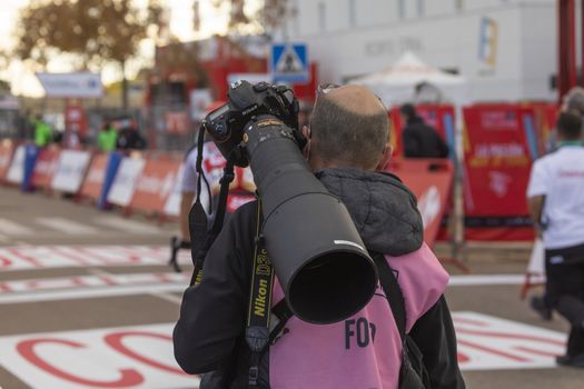 Journalists, photographers and media, working in the finish line area of the fourth stage of La Vuelta a España 2020.